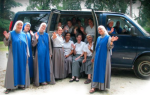 Sisters and postulants of the Servants of the Lors and the Virgin of Matara with their old van
